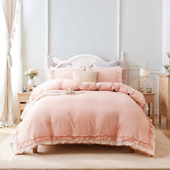 Front view of the pink ruffled cotton comforter set