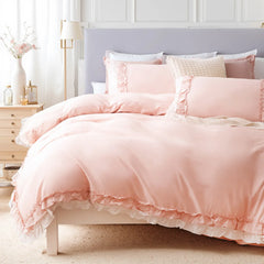 The ruffled comforter set styled on a bed in a modern, light-filled bedroom