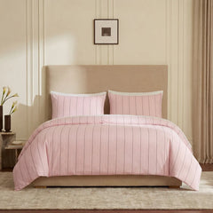 Full front view of pink striped bedding set