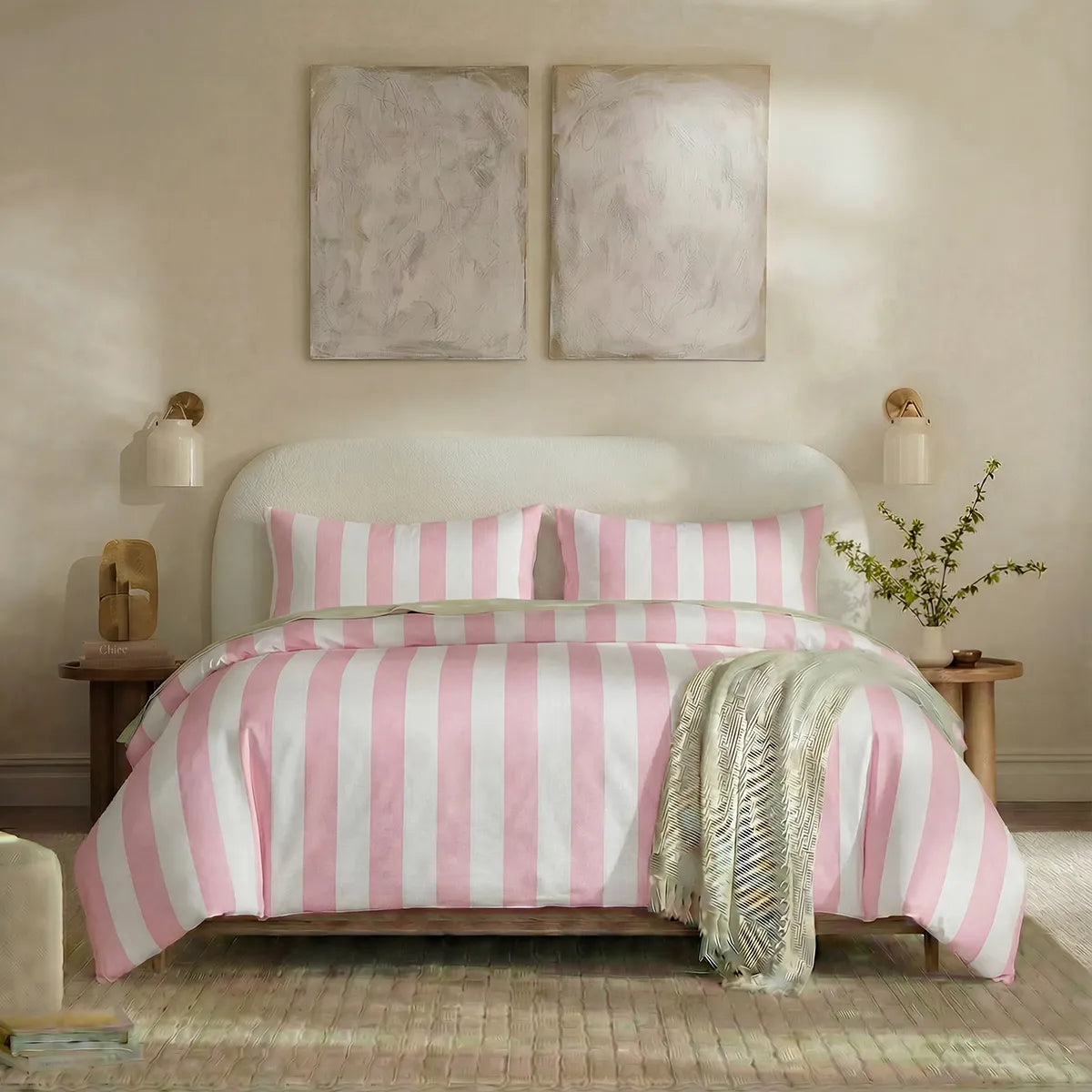Full front view of pink and white striped bedding set