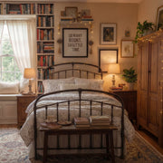 full bedroom view of wildflower duvet cover set featuring dark academia decor and vintage brass bed