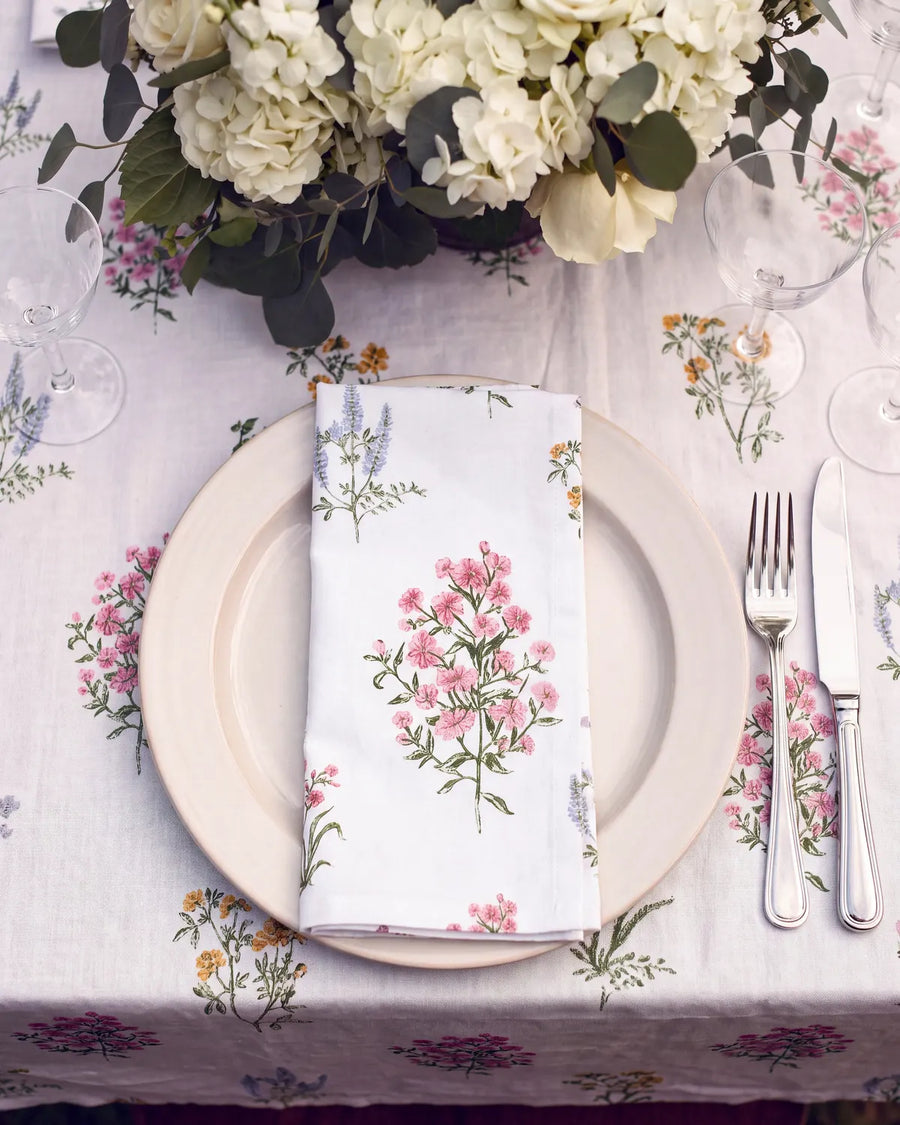 pressed botanical napkin folded on plate top view
