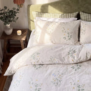 quiet garden meadow duvet cover set wooden nightstand candle eucalyptus