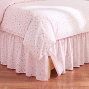 rosewick garden floral bed skirt pink ruffled hem hardwood floor