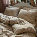 rustic windowpane oatmeal fabric texture close up breathable cotton