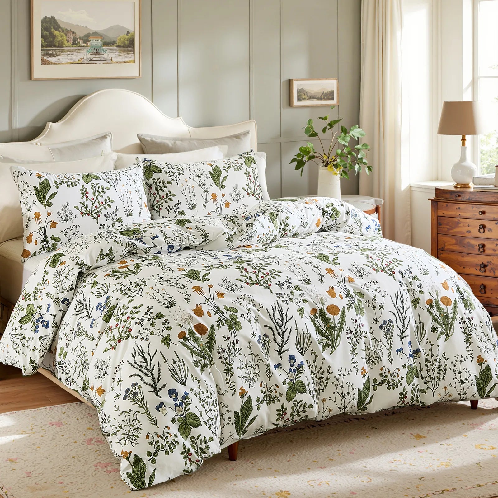 Angled view of a bed with a white comforter and pillows with a botanical floral pattern.