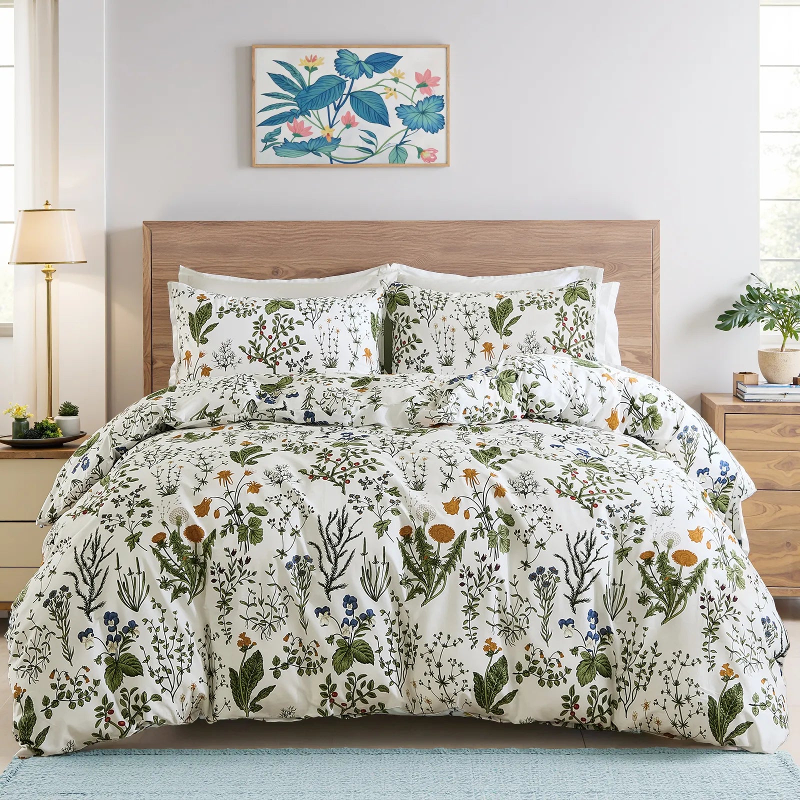 The sage green floral duvet cover set on a bed, showing the full design