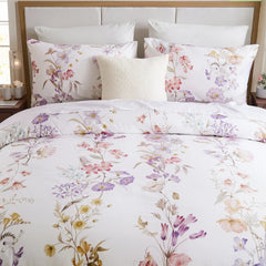 Front view detail of the comforter set with a decorative pillow