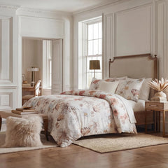 Lifestyle shot of shabby chic floral bedding in a bright elegant room