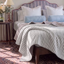 solace yarn dyed quilt charcoal solace dark wood table sunlight decor
