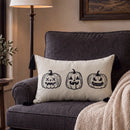 spooky season lumbar throw pillow cover ivory pumpkin face dark charcoal armchair