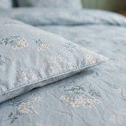 sprigged blue duvet cover fabric detail botanical print close up