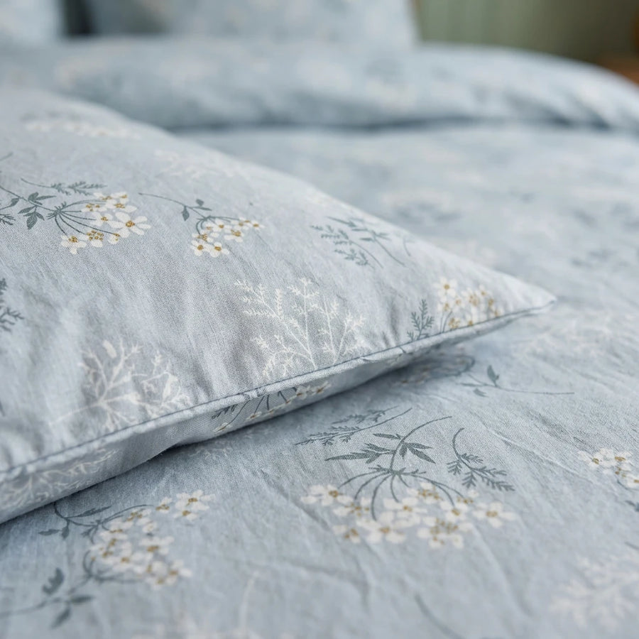 sprigged blue duvet cover fabric detail botanical print close up