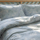 sprigged blue floral bedding set matching pillow shams close view