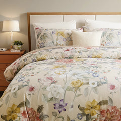 Spring floral duvet cover set on bed with matching pillows