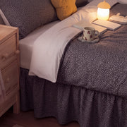 starlit bloom bed skirt dark grey bedding set nightstand lamp