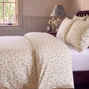 strawberry bramble comforter set cream pink pillows side table lamp