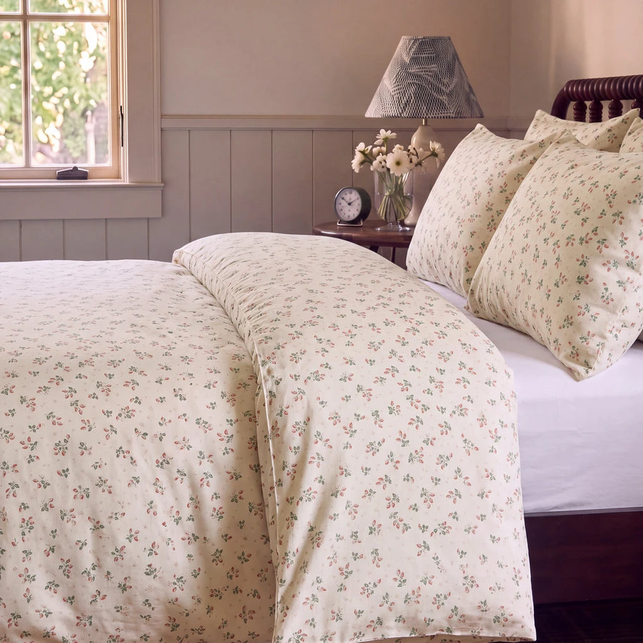 strawberry bramble comforter set cream pink pillows side table lamp