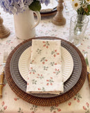 strawberry bramble napkin folded on plate top view