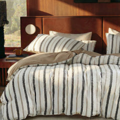 detail of matching striped pillowcases and duvet