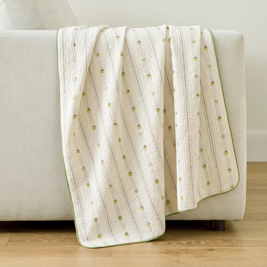 sunday patchwork muslin blanket strawberry green green trim cream sofa drape