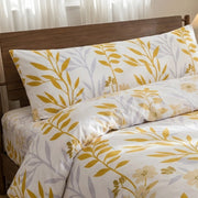 sunlit grey yellow shams close up shabby chic