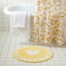 sweetheart rug buttercup yellow abc heart bathroom scene