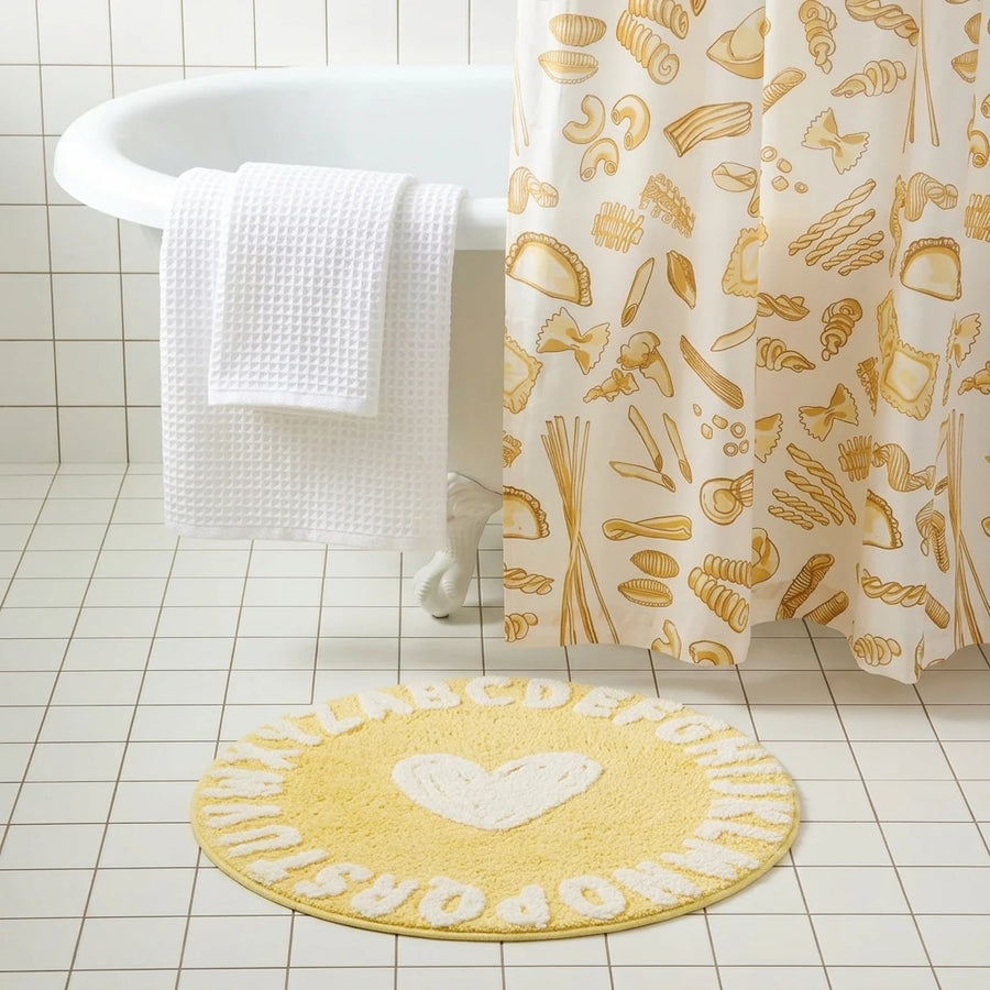 sweetheart rug buttercup yellow abc heart bathroom scene
