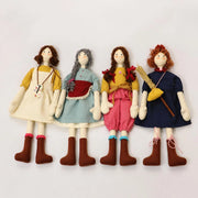 the hearthside sisters four piece cloth doll set white background
