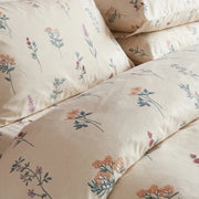 timeless wildflower meadow duvet cover set stacked pillow fabric closeup
