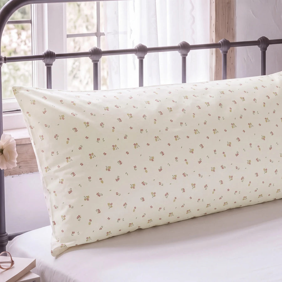 tiny blossom pillowcases cream floral pattern vintage metal bed window