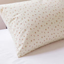 tiny blossom pillowcases cream yellow pink floral print close up