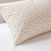 tiny blossom pillowcases cream yellow pink floral print close up