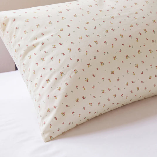 tiny blossom pillowcases cream yellow pink floral print close up