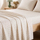 tiny blossom sheet set ditsy floral fabric closeup