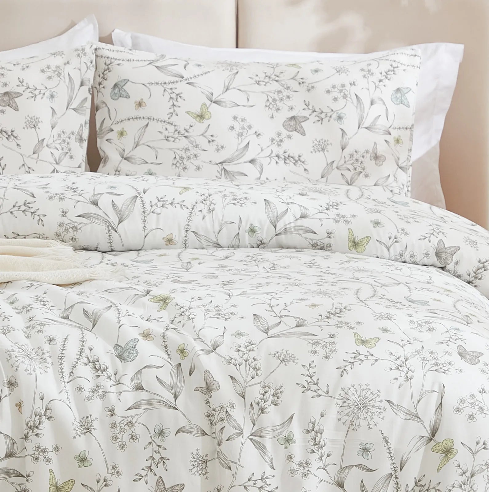 A detailed view of the 100% cotton fabric texture and subtle floral print