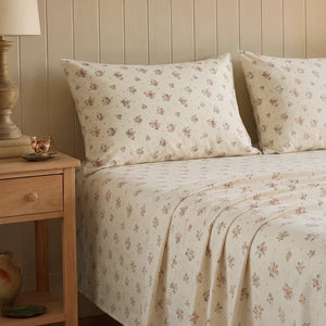 vintage sun drenched rose fitted sheet wooden nightstand scene