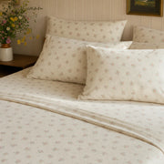 vintage sun drenched rose sheet set layered pillows