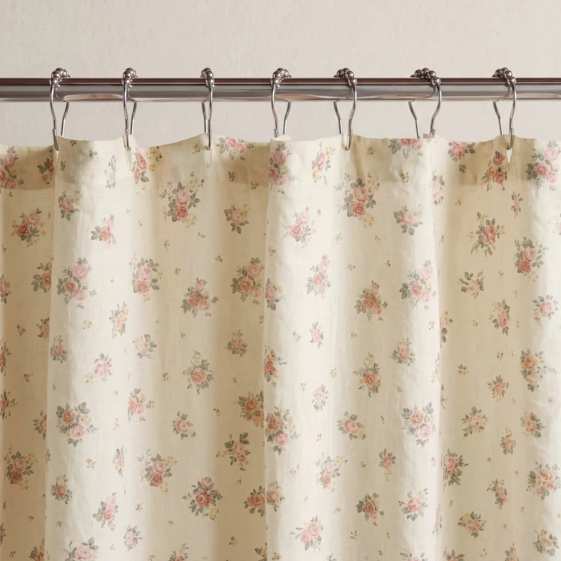 vintage sun drenched rose shower curtain cream pink metal rings close up