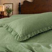 washed cotton ruffled pillowcase green soft lighting