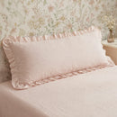 washed cotton ruffled pillowcase pink soft lighting