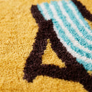 wave rider rug golden lounge tufted texture closeup