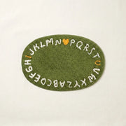 whimsy garden rug abc meadow flat lay product photo