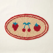 whimsy garden rug berry patch flat lay product photo