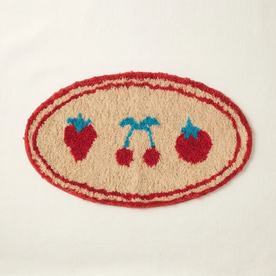 whimsy garden rug berry patch flat lay product photo