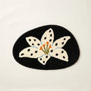 whimsy garden rug lily at midnight flat lay product photo
