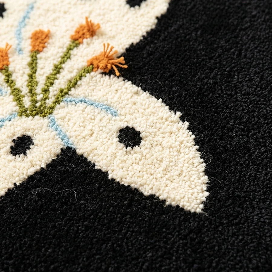 whimsy garden rug lily at midnight tufted texture closeup