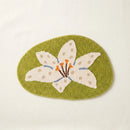 whimsy garden rug lily in bloom flat lay product photo