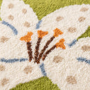 whimsy garden rug lily in bloom tufted texture closeup