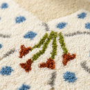 whimsy garden rug lily on sand tufted texture closeup